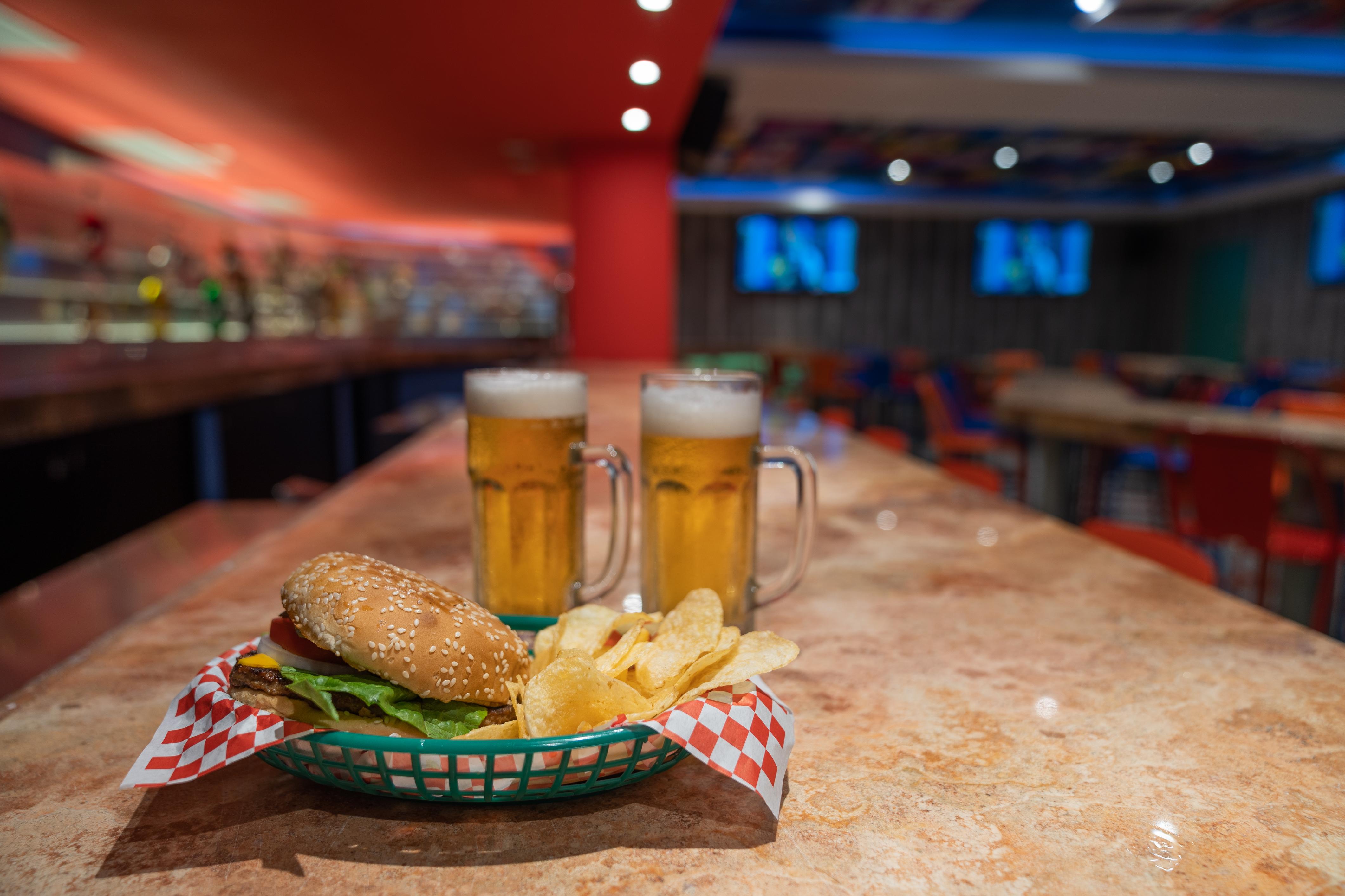 Grand Park Royal Puerto Vallarta Buitenkant foto A hamburger and chips with two beers